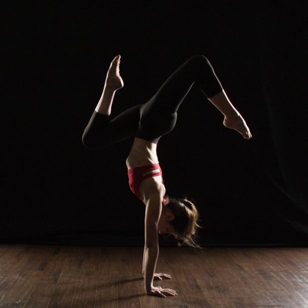 Yoga handstand pose dark background home lyt 4